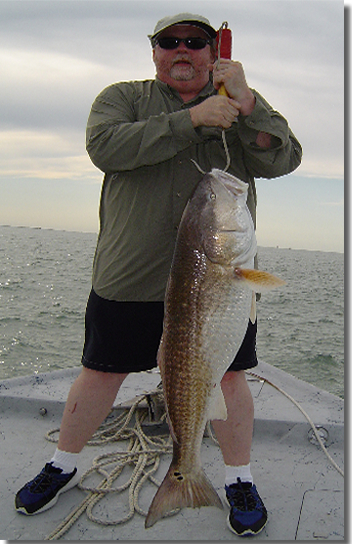 Captain Joh Frankson & Guest With A Huge 44-1/2" Bull Red..