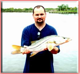 Captain Ron Thomas Guest with a nice Snook.