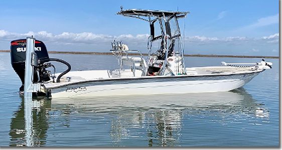 Captain Lynn Smith  Uses A 24 FT. Shallow Sport Fishing Boat, Powerd By A Suzuki 250-HP Four Stroke  Outboard. 